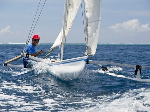 Tahitian style outrigger sailing canoe © Julien Girardot